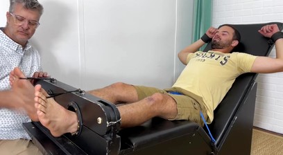 Bound hairy guy endures tickling torment while toe sucked