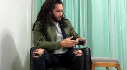 Handsome dude with long hair Nathaniel shows off his feet