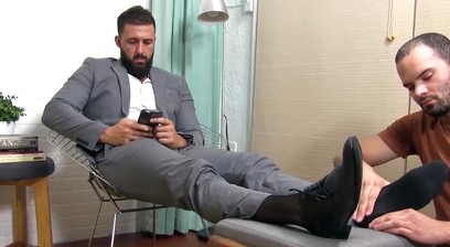 Handsome bearded businessman foot licked and worshipped