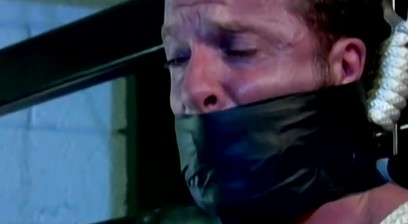Derek is bound and has his balls pulled tight