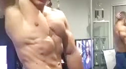 cute jock flexes ripped muscles